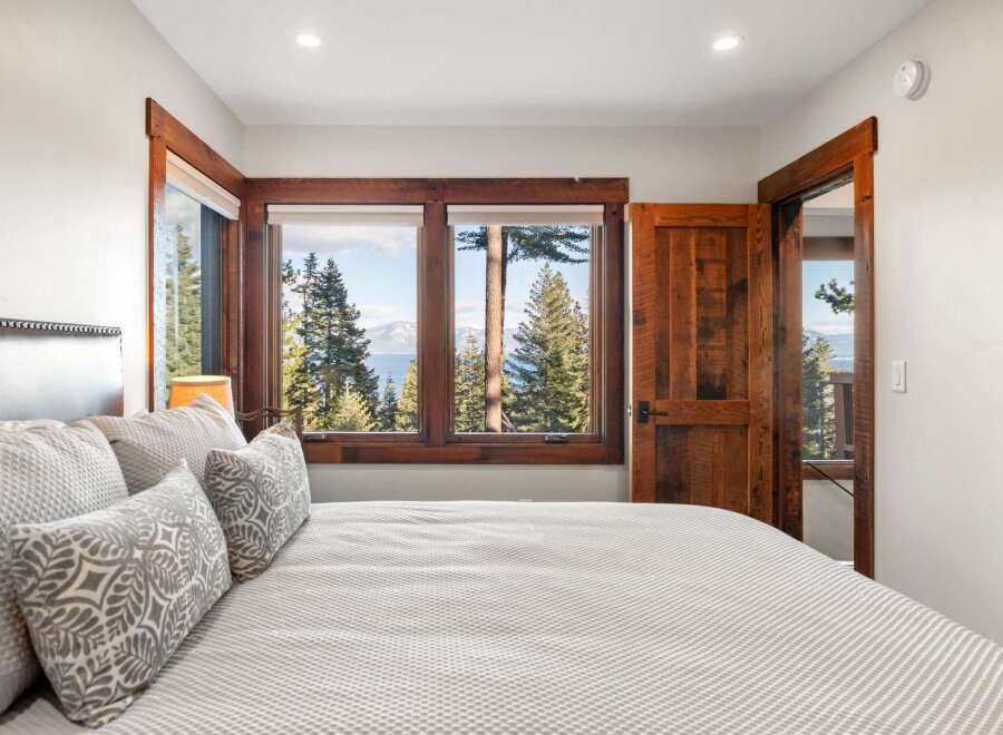 Experience the tranquility of this stunning bedroom with breathtaking views.