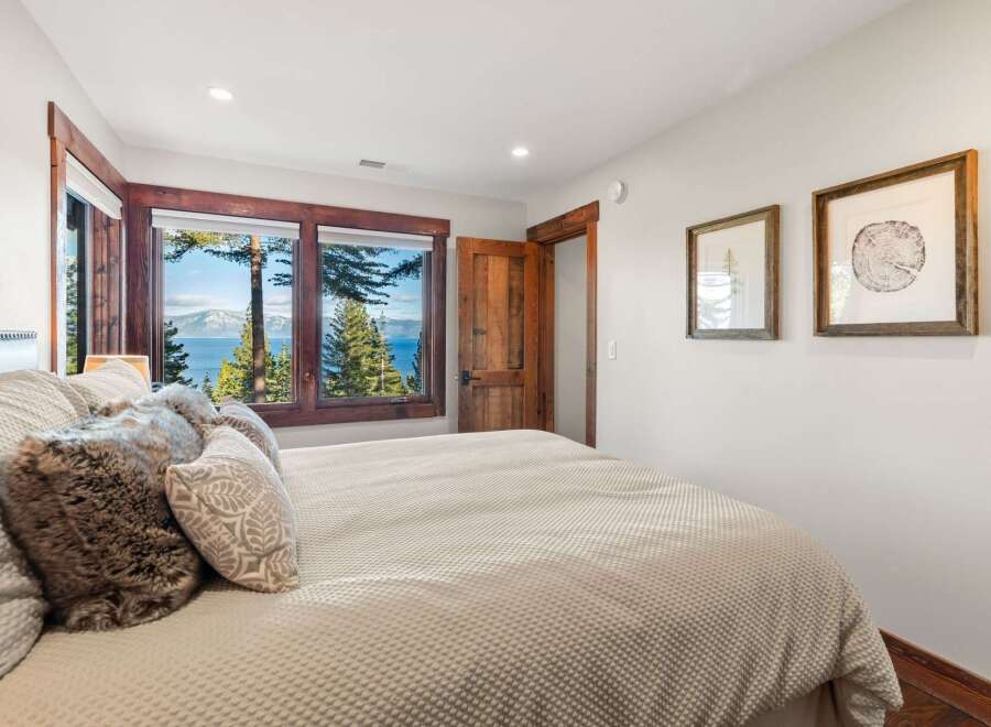Experience the tranquility of this stunning bedroom with breathtaking views.