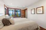 Experience the tranquility of this stunning bedroom with breathtaking views.