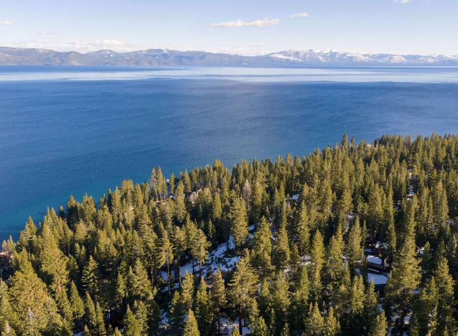 Discover the tranquility of lakeside living with this stunning property.