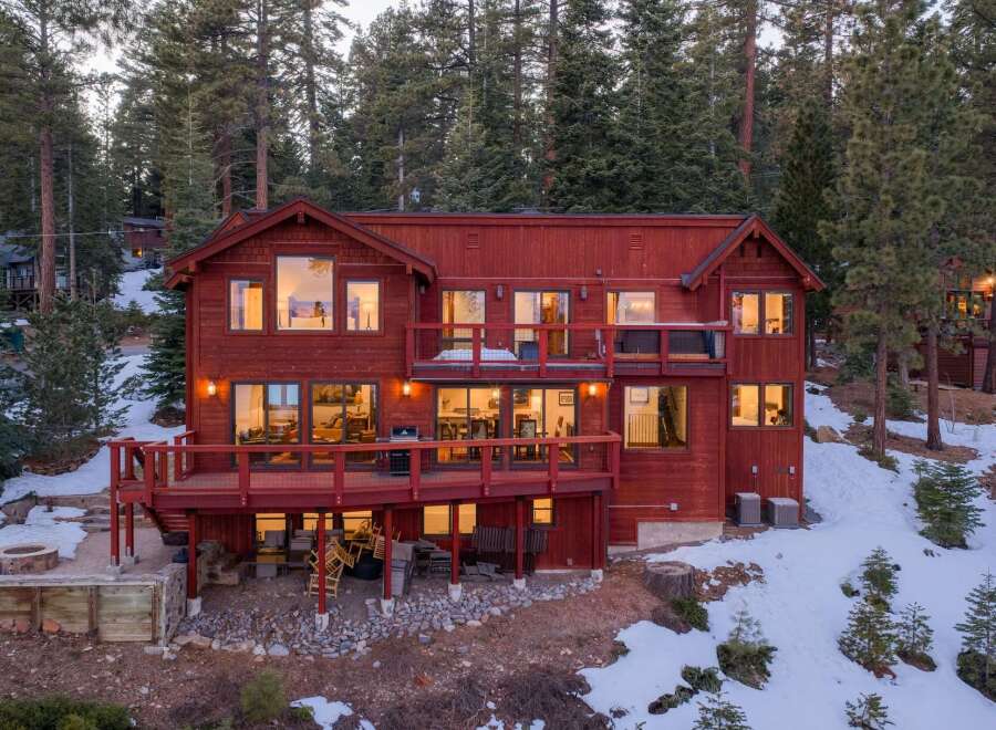 This stunning mountain home offers a perfect blend of rustic charm and modern luxury.