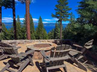 Enjoy breathtaking lake and mountain views from this stunning property, perfect for outdoor entertaining.