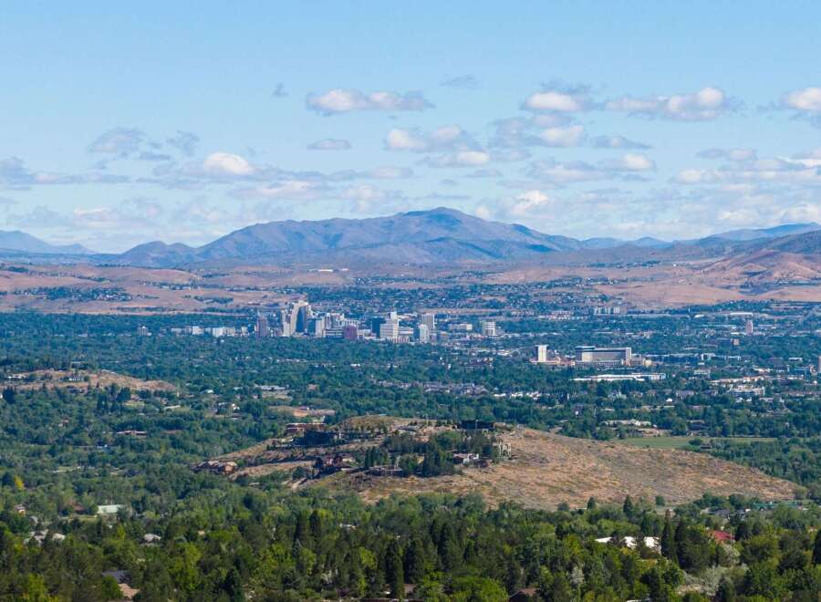 Experience breathtaking panoramic views of the city skyline and surrounding mountains from this elevated vantage point.