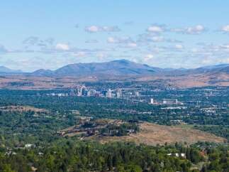 Experience breathtaking panoramic views of the city skyline and surrounding mountains from this elevated vantage point.
