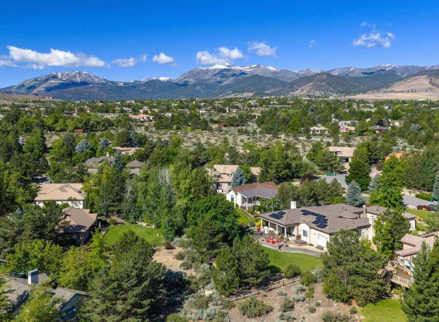 Discover this stunning property nestled amidst lush greenery with breathtaking mountain views.