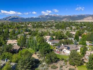 Discover this stunning property nestled amidst lush greenery with breathtaking mountain views.