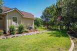 Discover this charming home featuring a well-maintained exterior with a light-colored siding and a classic shingle roof.