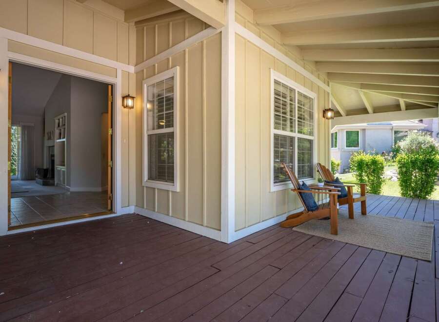 Step onto the inviting covered porch, perfect for enjoying your morning coffee or evening relaxation.