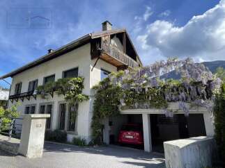 Charming property with a beautiful facade and a garage.