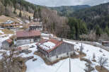 Nestled in a picturesque mountain setting, this property offers a unique blend of rustic charm and natural beauty.