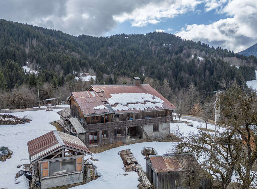 Nestled in a serene mountain landscape, this charming property offers a unique blend of rustic charm and natural beauty.