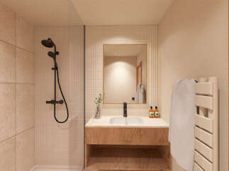 Step into a beautifully designed bathroom featuring modern fixtures and a warm, inviting aesthetic.
