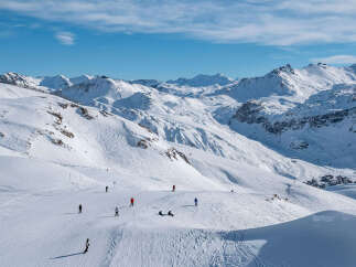 Experience the ultimate alpine lifestyle with this stunning ski resort property, offering breathtaking panoramic views of snow-capped mountains.