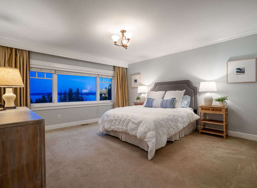 This stunning bedroom offers breathtaking views and a serene atmosphere.