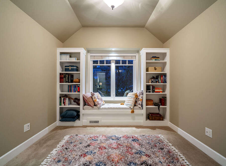 Discover the charm of this cozy reading nook, perfect for relaxation and quiet moments.