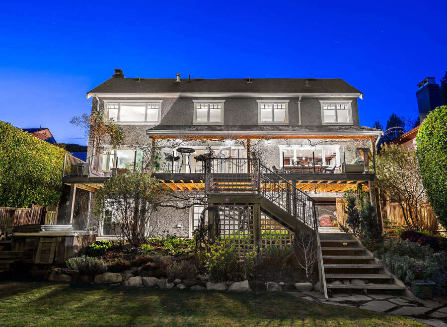 This stunning property boasts a beautifully designed exterior, perfect for evening gatherings.