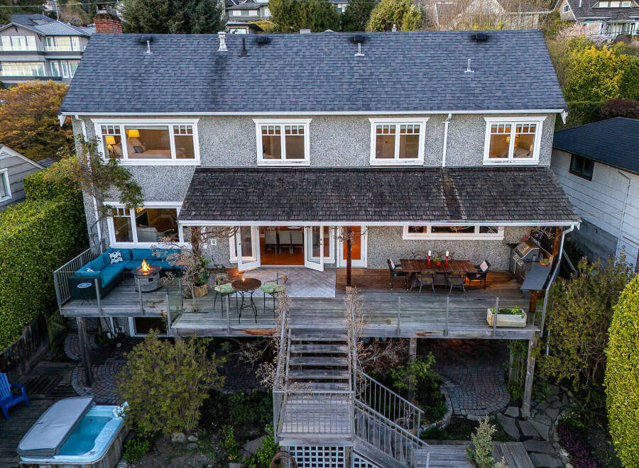 This stunning property boasts a multi-level deck, perfect for entertaining and enjoying the outdoors.