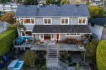 This stunning property boasts a multi-level deck, perfect for entertaining and enjoying the outdoors.