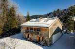 Discover the charm of this stunning chalet nestled in a winter wonderland.