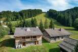 Nestled in a picturesque mountain setting, this stunning property offers a blend of rustic charm and modern comfort.