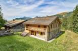 Discover the charm of this stunning chalet nestled in a picturesque mountain setting.