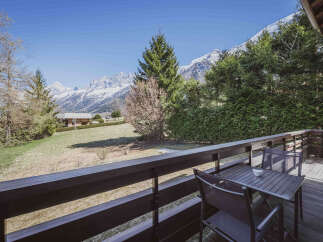 Enjoy breathtaking mountain views from this charming property.