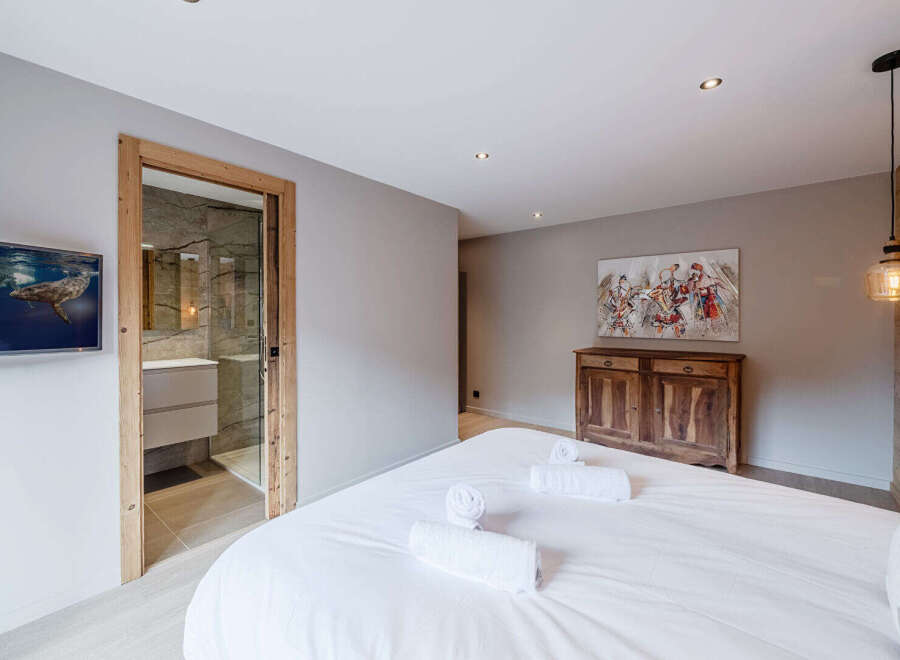 Discover the epitome of comfort and style in this beautifully designed bedroom.