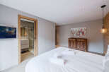 Discover the epitome of comfort and style in this beautifully designed bedroom.