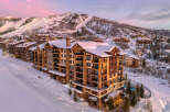 Experience luxury living at this stunning ski-in/ski-out property, featuring breathtaking mountain views and direct access to the slopes.