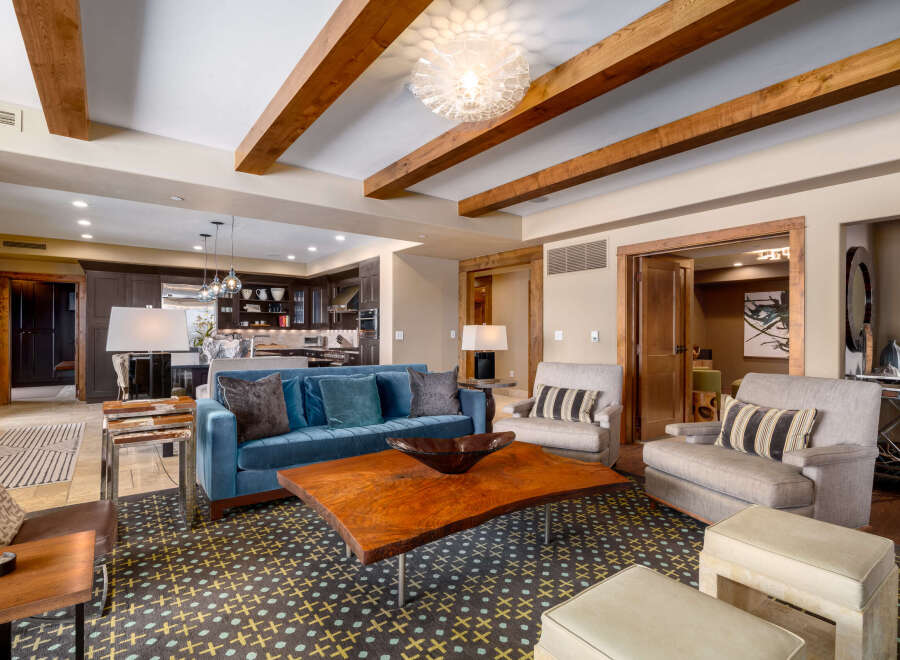 This stunning living room boasts a modern design with a touch of rustic charm.