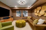 Step into luxury with this stunning media room, perfect for entertaining or relaxing.