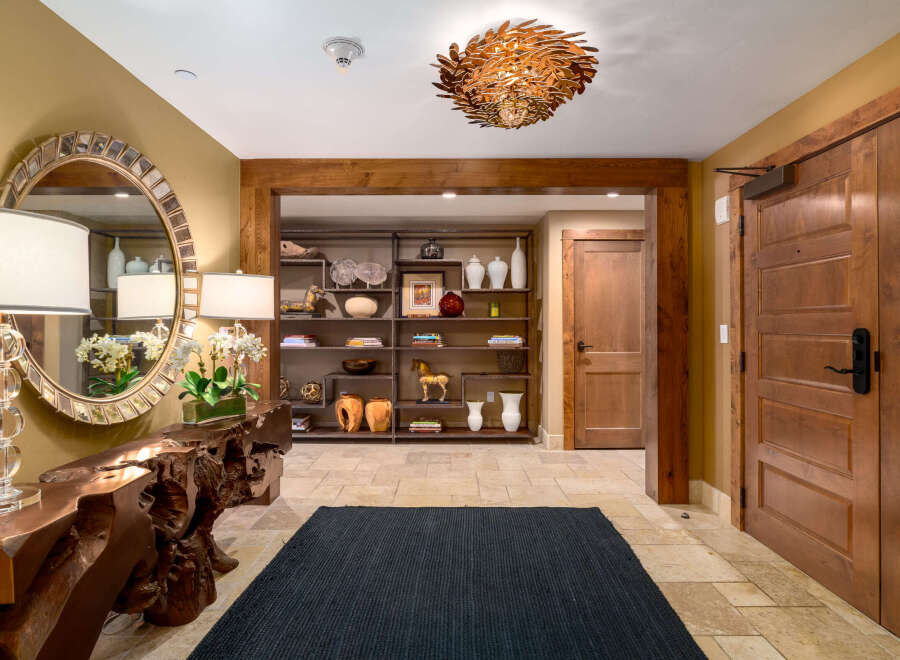 Step into luxury with this stunning entryway, showcasing exquisite craftsmanship and design.