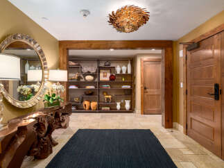 Step into luxury with this stunning entryway, showcasing exquisite craftsmanship and design.