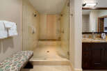 Step into luxury with this stunning bathroom featuring a spacious walk-in shower.