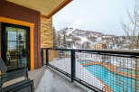 Enjoy stunning mountain views from this luxurious balcony.