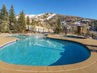 Enjoy the luxury of this stunning property with a beautiful outdoor pool, perfect for relaxation and recreation.