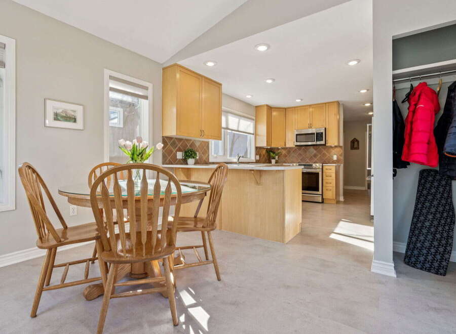 This stunning kitchen and dining area offers a bright and inviting space for everyday living and entertaining.