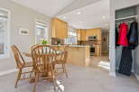 This stunning kitchen and dining area offers a bright and inviting space for everyday living and entertaining.
