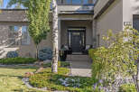 This stunning property boasts a modern facade with a welcoming entrance.