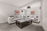 This stunning media room offers a luxurious space for entertainment.