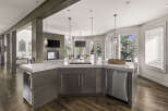 This stunning kitchen boasts a modern design with a spacious island, perfect for entertaining.
