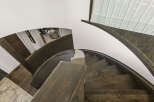 This stunning property boasts a beautifully designed curved staircase, a true architectural highlight.