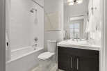 Step into a beautifully designed bathroom featuring modern fixtures and a clean aesthetic.