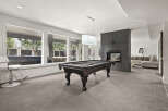 This stunning property boasts a luxurious game room, perfect for entertaining and relaxation.