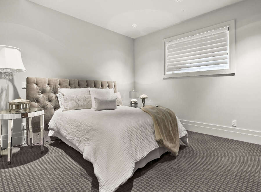 Step into a serene bedroom retreat, designed for ultimate comfort and style.