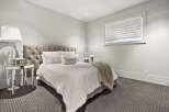 Step into a serene bedroom retreat, designed for ultimate comfort and style.