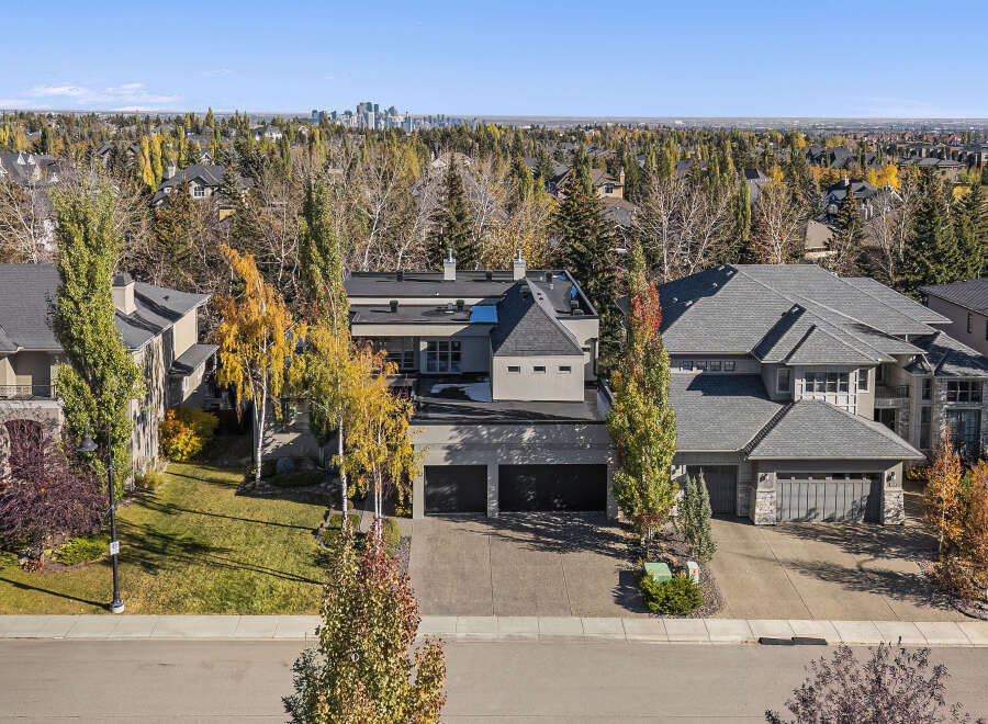 This stunning property boasts a modern design with a sleek exterior and ample space.