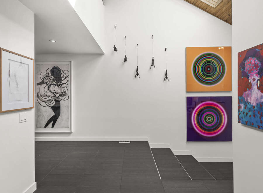 This stunning property boasts a modern art gallery feel, perfect for showcasing your unique style.
