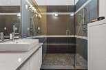 Step into luxury with this stunning bathroom featuring a modern design.