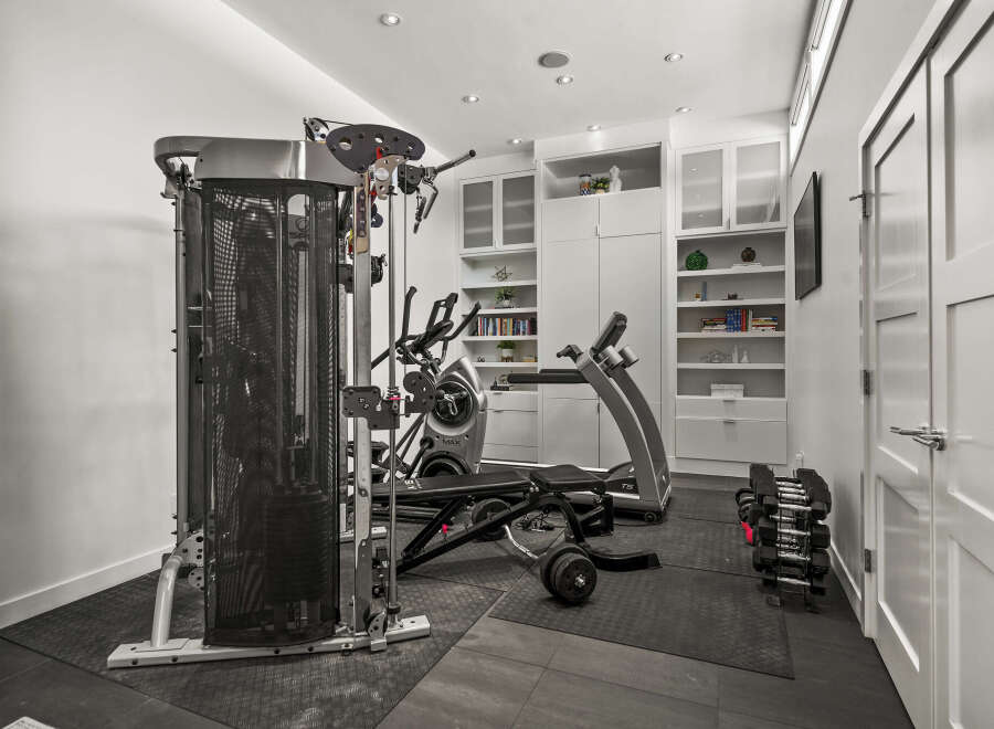 This home gym is the perfect space to achieve your fitness goals.